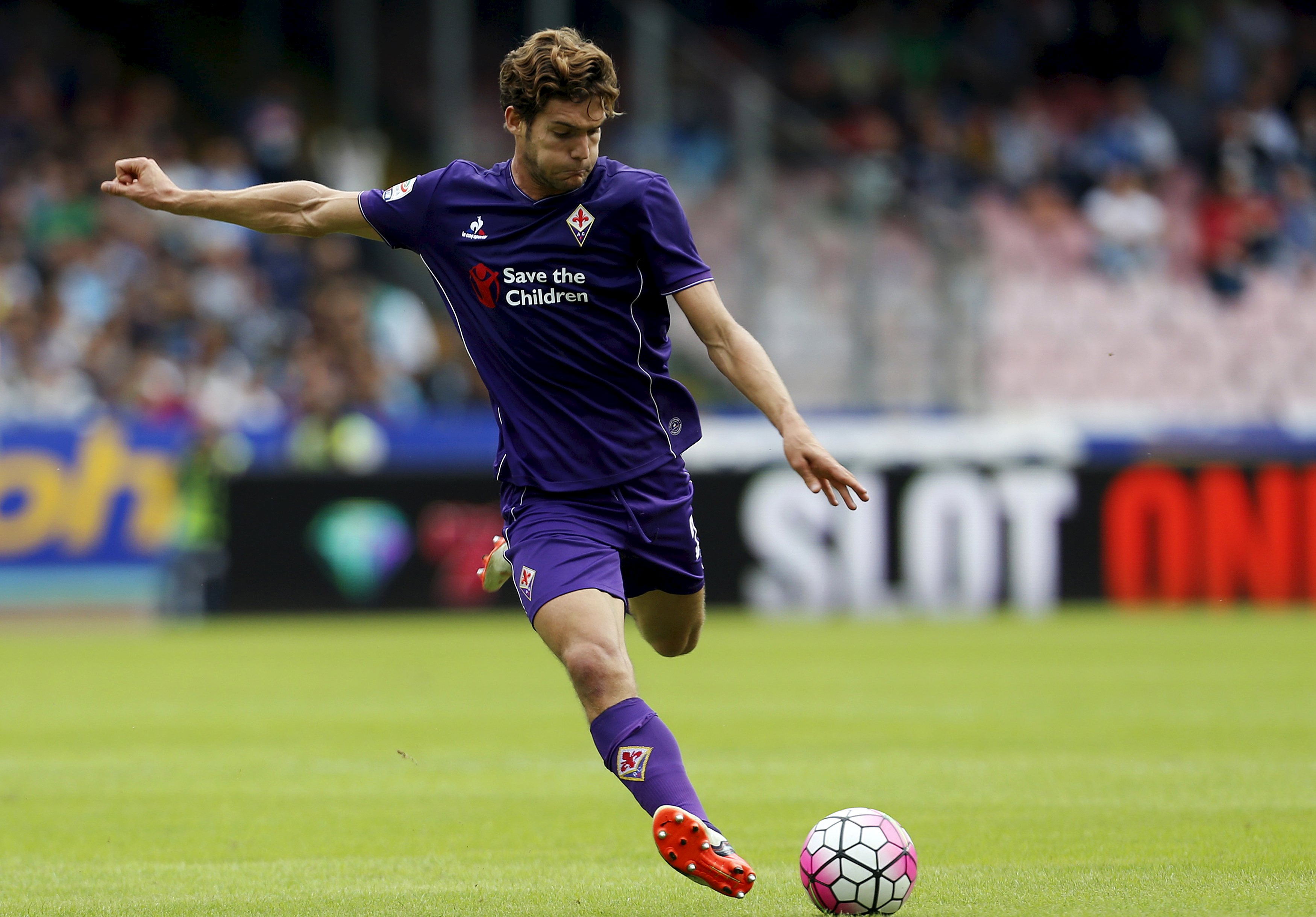 Fiorentina's Alonso shoots a ball during their Italian Serie A soccer match against Napoli in Naples