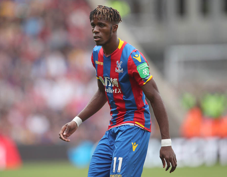 Wilfried Zaha is keen on making a shock move to Chelsea this summer.