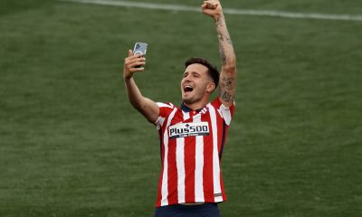 Saul Niguez of Atletico Madrid celebrates after winning the league championship