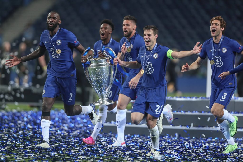 Chelsea players with the UEFA Champions League trophy.