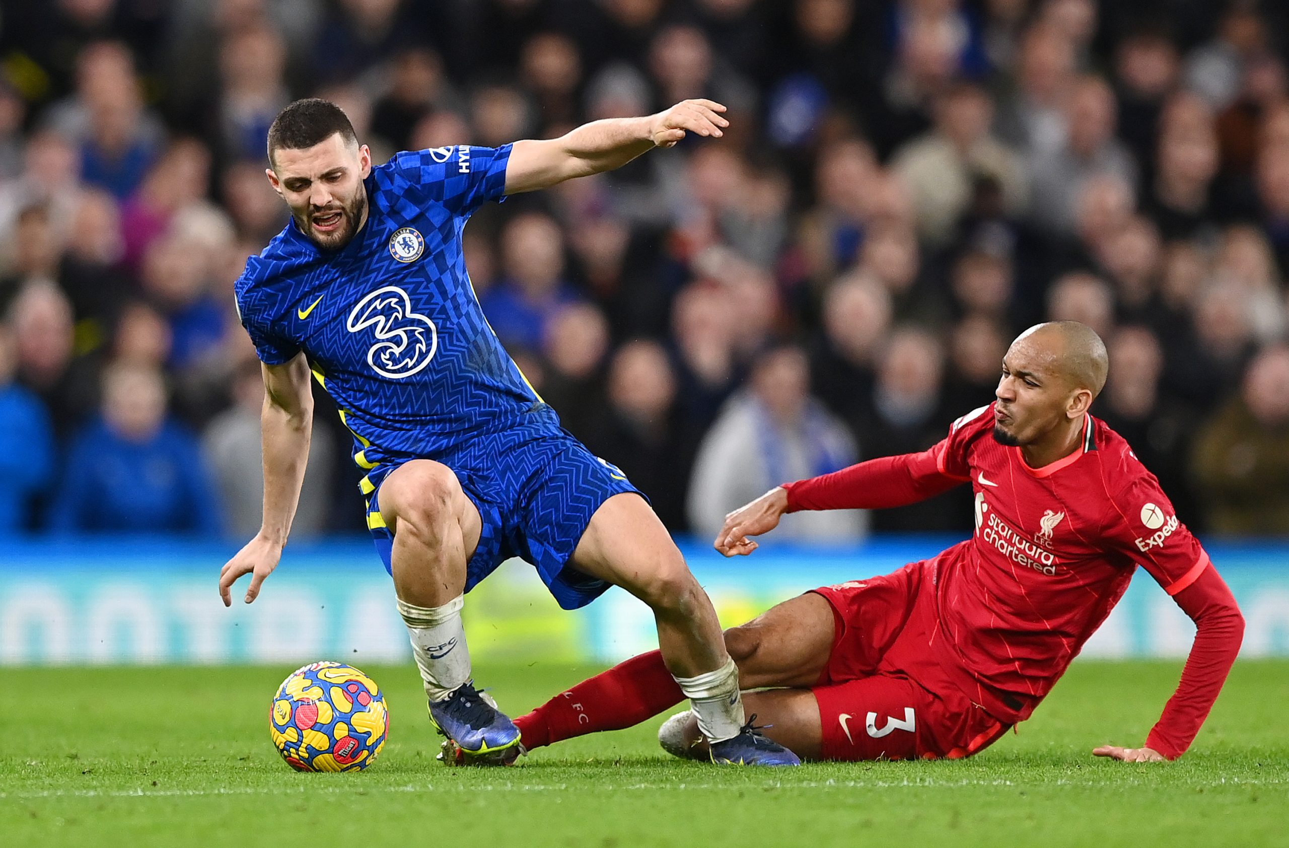 Mateo Kovacic in action against Fabinho of Liverpool. (Photo by Shaun Botterill/Getty Images)