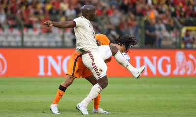 Netherlands' Nathan Ake and Belgium's Romelu Lukaku fight for the ball.