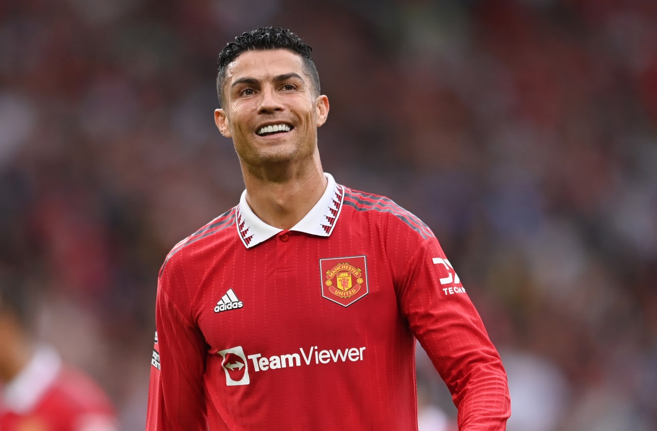 MANCHESTER, ENGLAND – SEPTEMBER 04: Cristiano Ronaldo of Manchester United smiles during the Premier League match between Manchester United and Arsenal FC at Old Trafford on September 04, 2022 in Manchester, England. (Photo by Michael Regan/Getty Images)