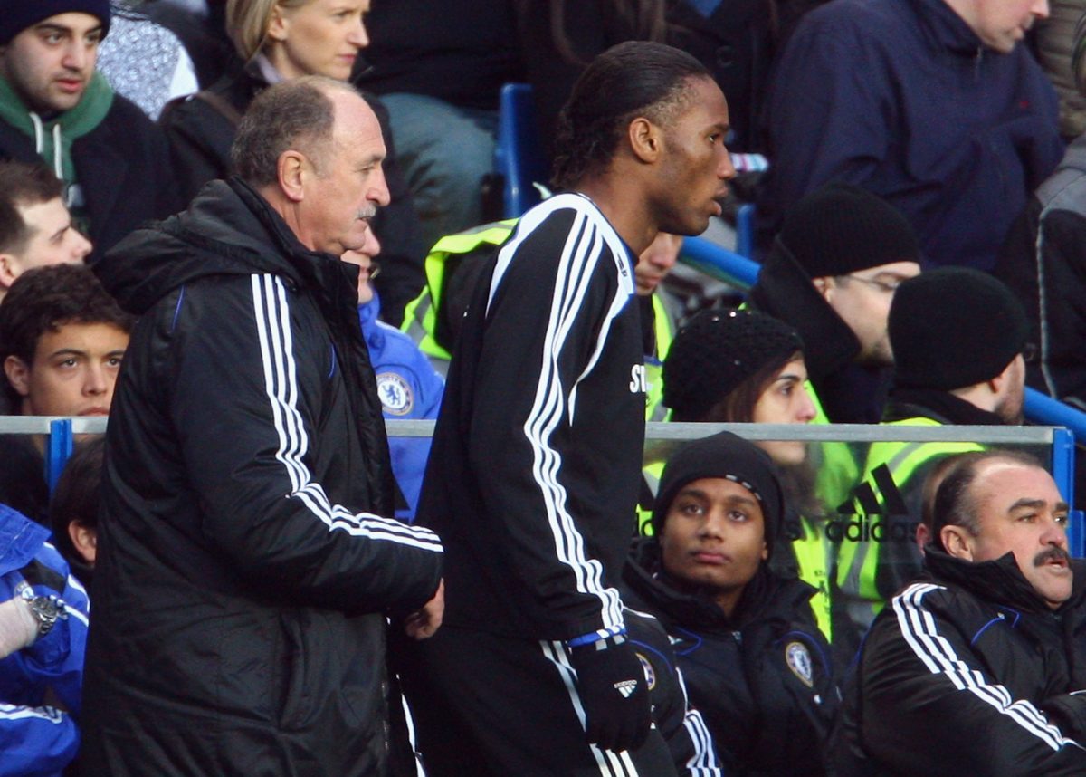 Didier Drogba of Chelsea stands next to Luiz Felipe Scolari during an FA Cup fourth-round match against Ipswich Town.  