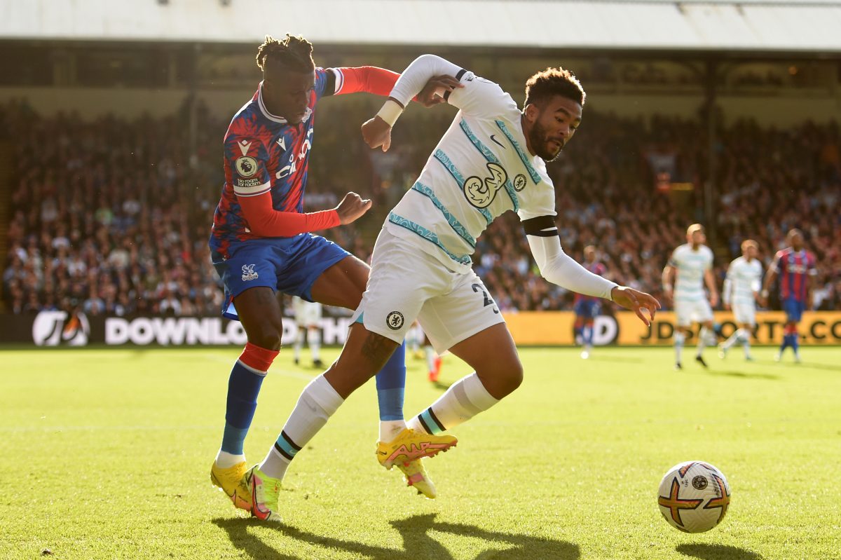 Reece James of Chelsea is challenged by Wilfried Zaha of Crystal Palace. 