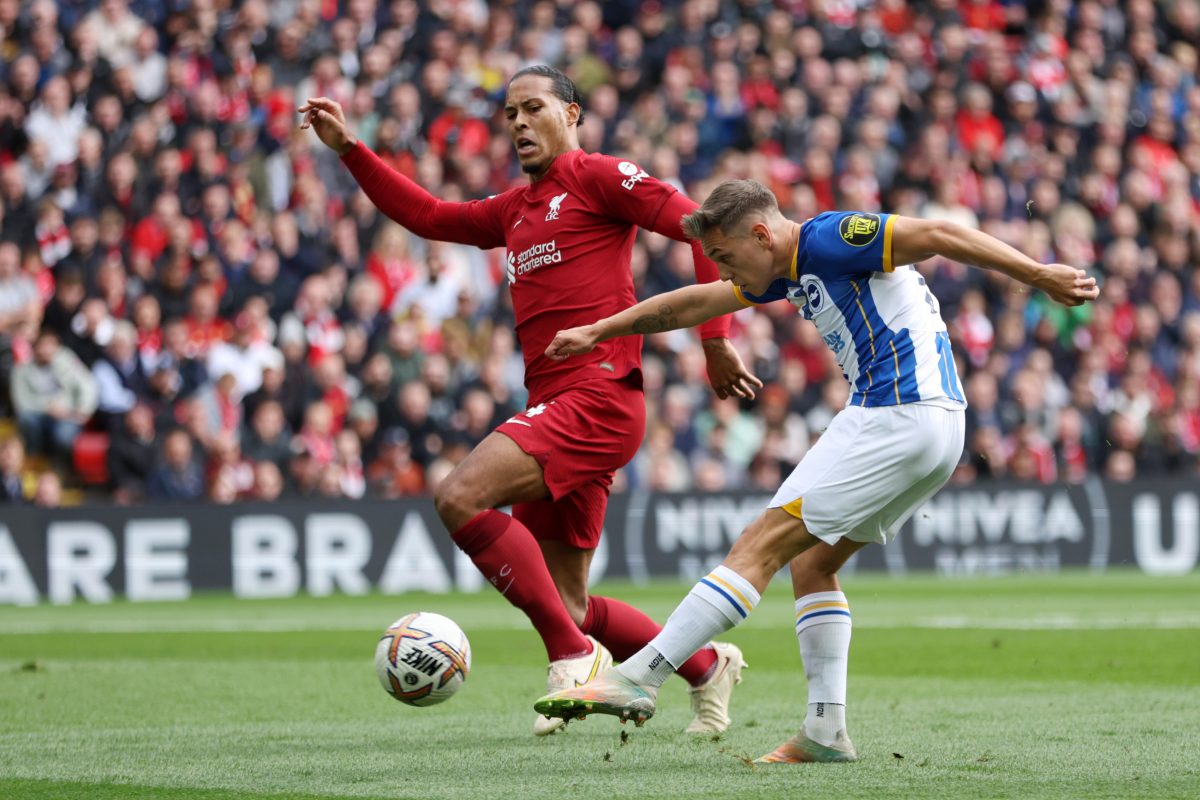 Leandro Trossard of Brighton shoots past Liverpool's Virgil van Dijk. (Photo by Clive Brunskill/Getty Images)
