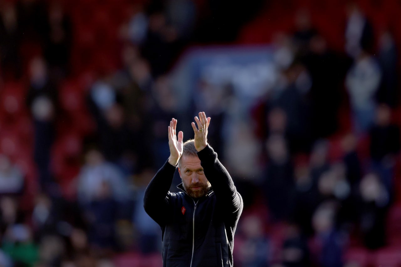 Graham Potter applauds Chelsea’s fans after his first win as the manager of the club, against Crystal Palace.