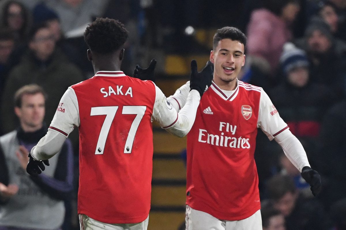 Gabriel Martinelli celebrates scoring against Chelsea with Arsenal teammate, Bukayo Saka. 