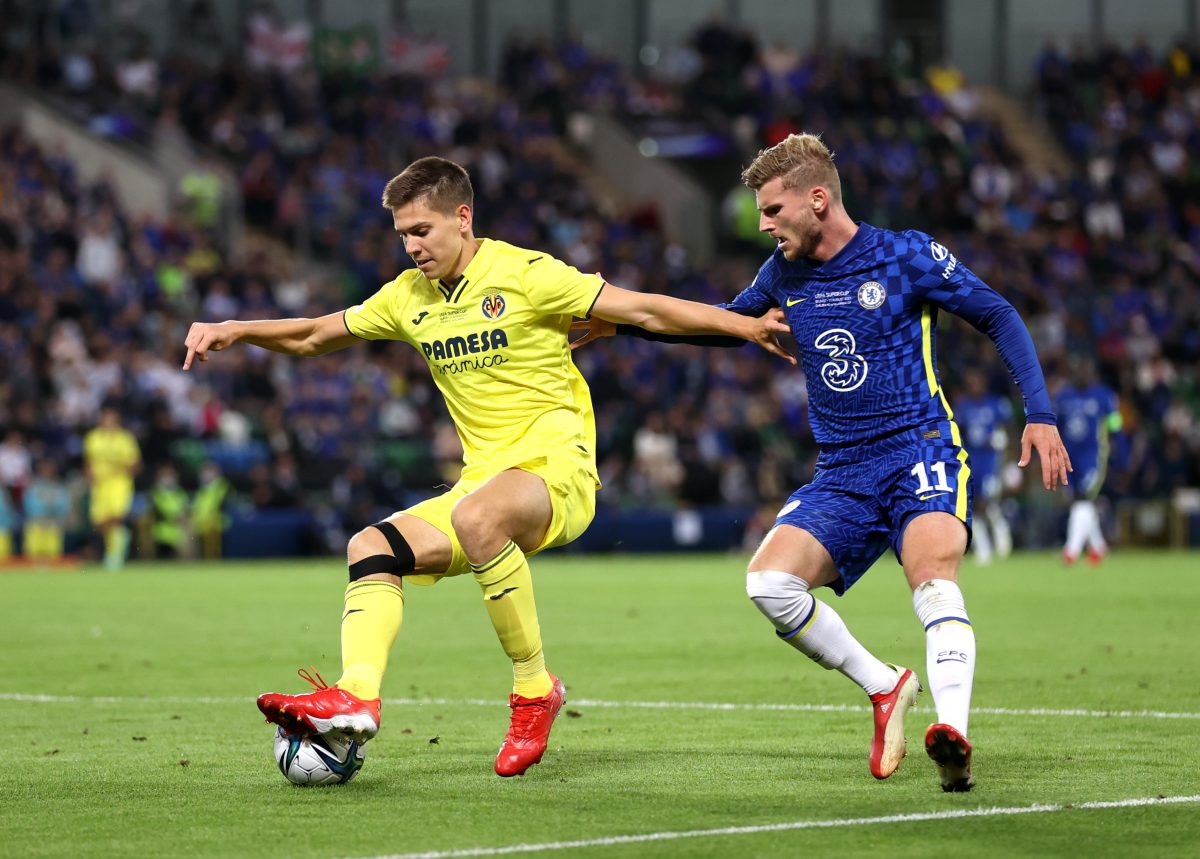 Juan Foyth of Villarreal is challenged by Timo Werner of Chelsea  during the UEFA Super Cup match in 2021. 