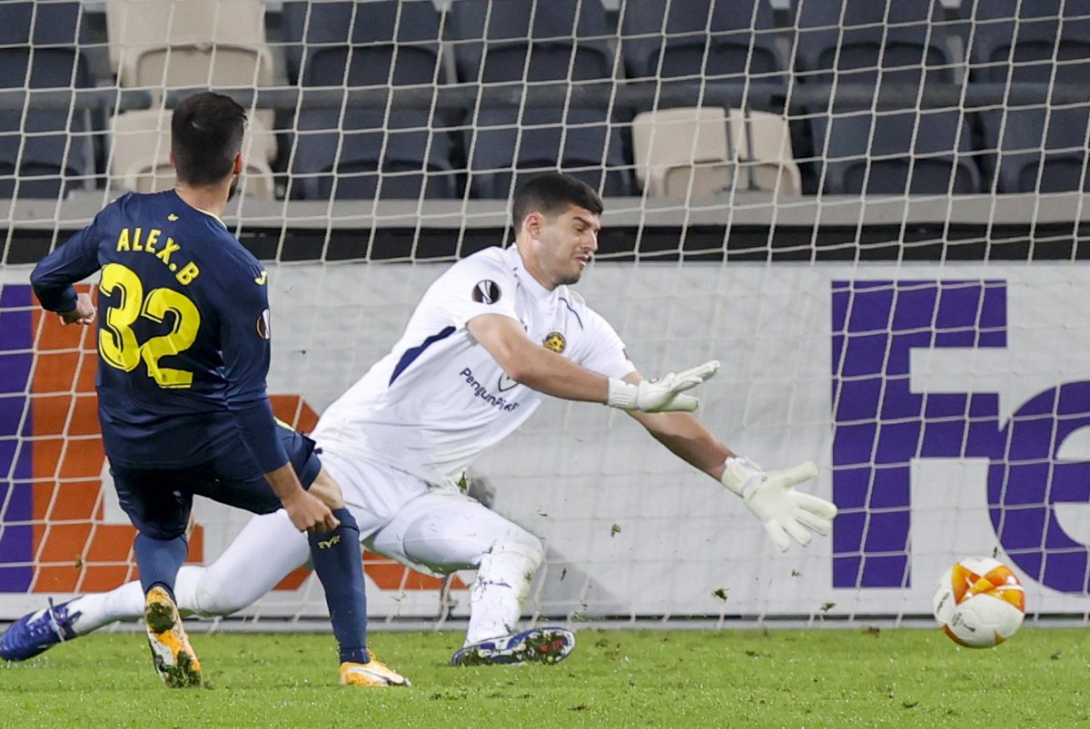Villareal's Alex Baena shoots the ball past Maccabi's Daniel Tenenbaum
