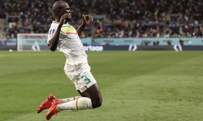 Kalidou Koulibaly of Senegal celebrates scoring a hugely important FIFA World Cup goal against Ecuador.
