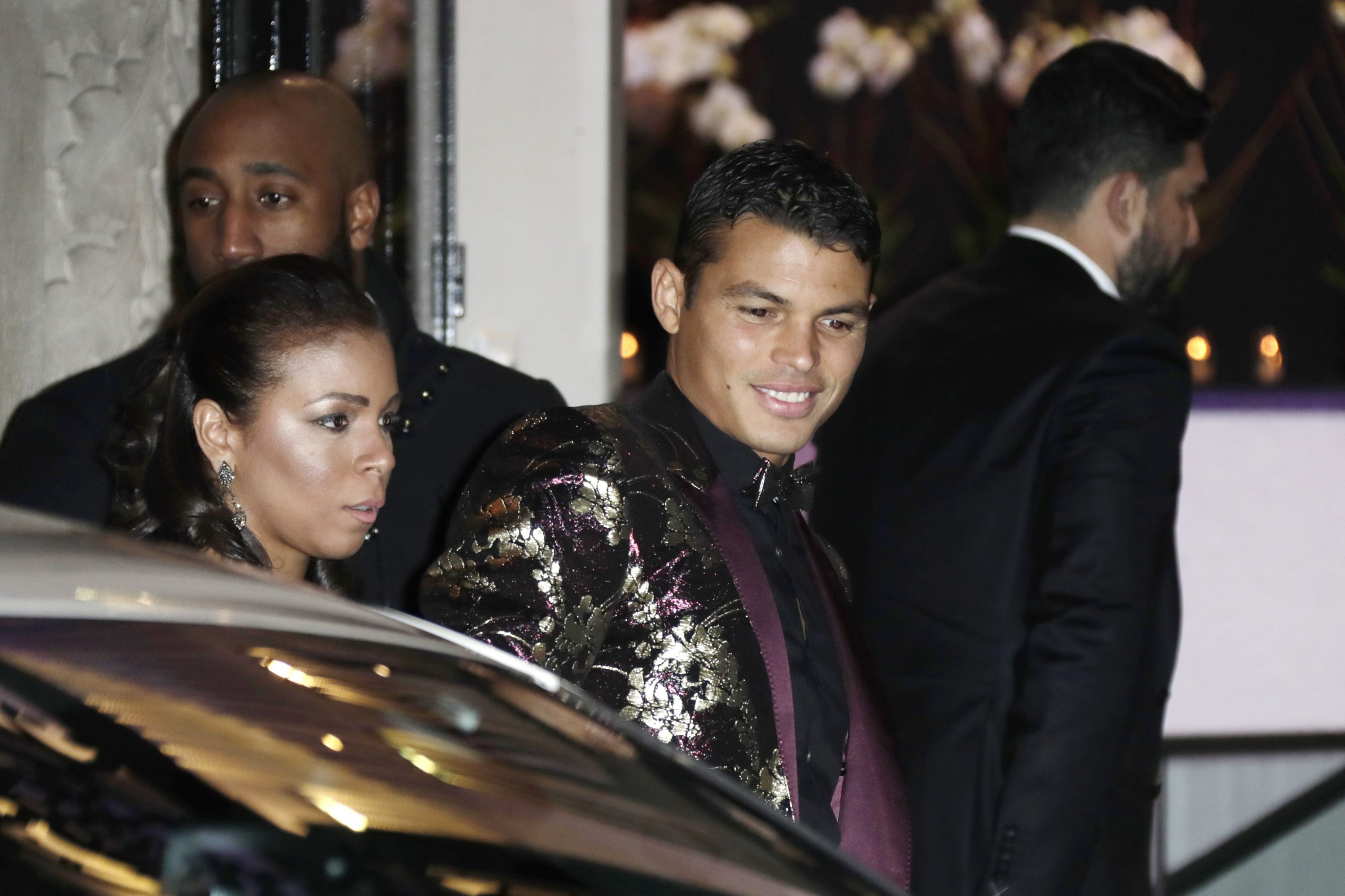 Thiago Silva with his wife during his time at PSG. (Photo by THOMAS SAMSON/AFP via Getty Images)