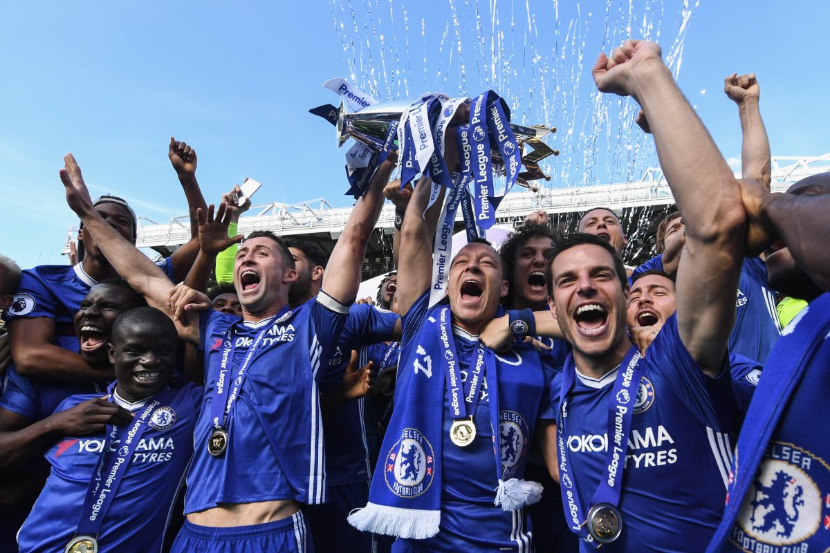 LONDON, ENGLAND - MAY 21: Ngolo Kante, Gary Cahill, John Terry and Cesar Azpilicueta of Chelsea celebrates with the Premier League Trophy after the Premier League match between Chelsea and Sunderland at Stamford Bridge on May 21, 2017 in London, England. 