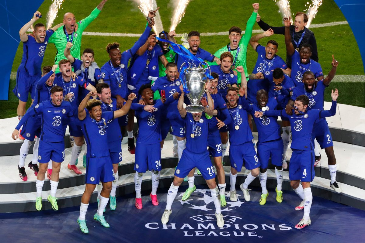 Chelsea's Spanish defender Cesar Azpilicueta (C) celebrates with the trophy after winning the UEFA Champions League final football match at the Dragao stadium in Porto on May 29, 2021