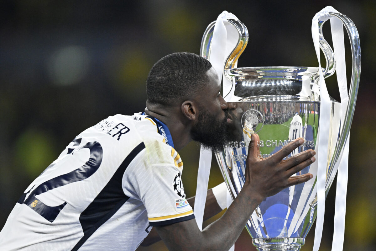 Rüdiger with his second Champions League trophy. (Photo by INA FASSBENDER / AFP) (Photo by INA FASSBENDER/AFP via Getty Images)